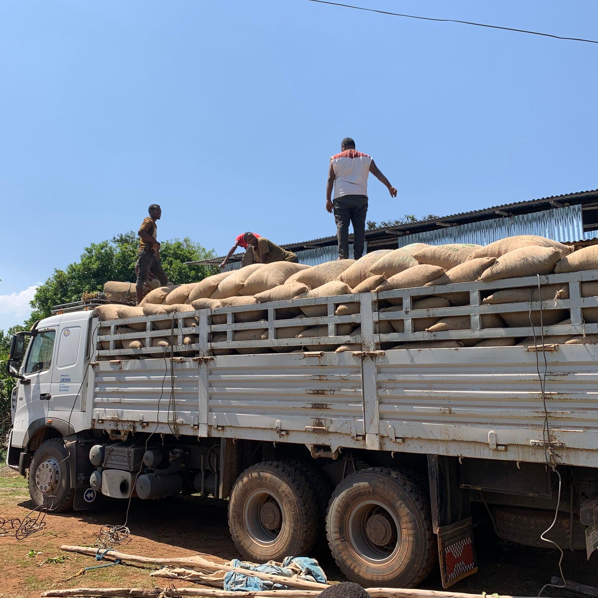 Sinotruk loaded with commodity sacks for agricultural supply chain transport in Tanzania
